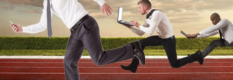 Businessman running on running track